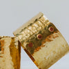 Close-up of Copper Rivet On Brass Napkin Ring