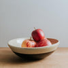 Stoneware serving bowl with apples