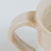 close up of stoneware mug handle