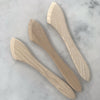 Three wooden butter knives