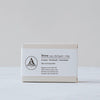 Soap in pale grey textured box with white bellyband