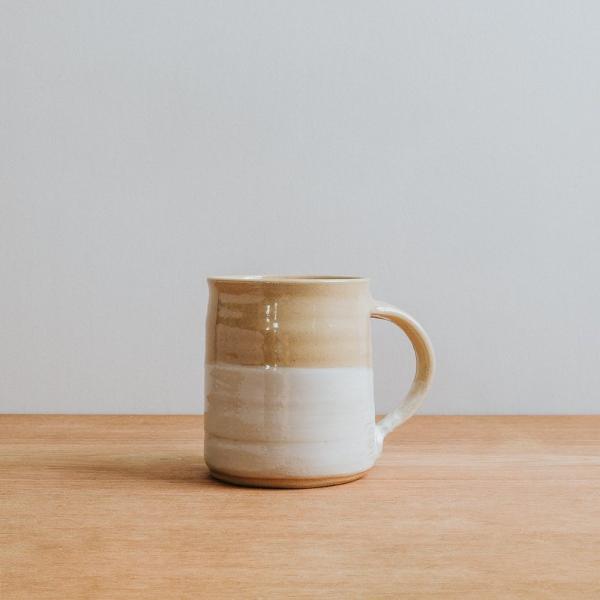 Handmade stoneware mug with white stripe