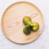 Looking Down on Wooden Plate with Pears
