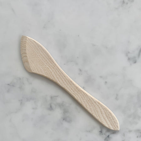 Pale wood butter knife